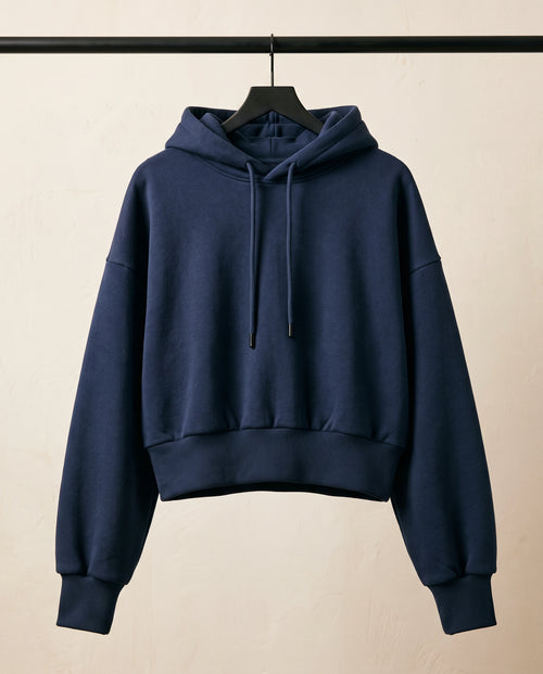 Le Hoodie Cocon — coupe courte, intérieur molletonné