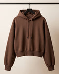 Le Hoodie Cocon — coupe courte, intérieur molletonné